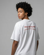 Minimalist White Boxy T-Shirt with "Hold Me Close" Text